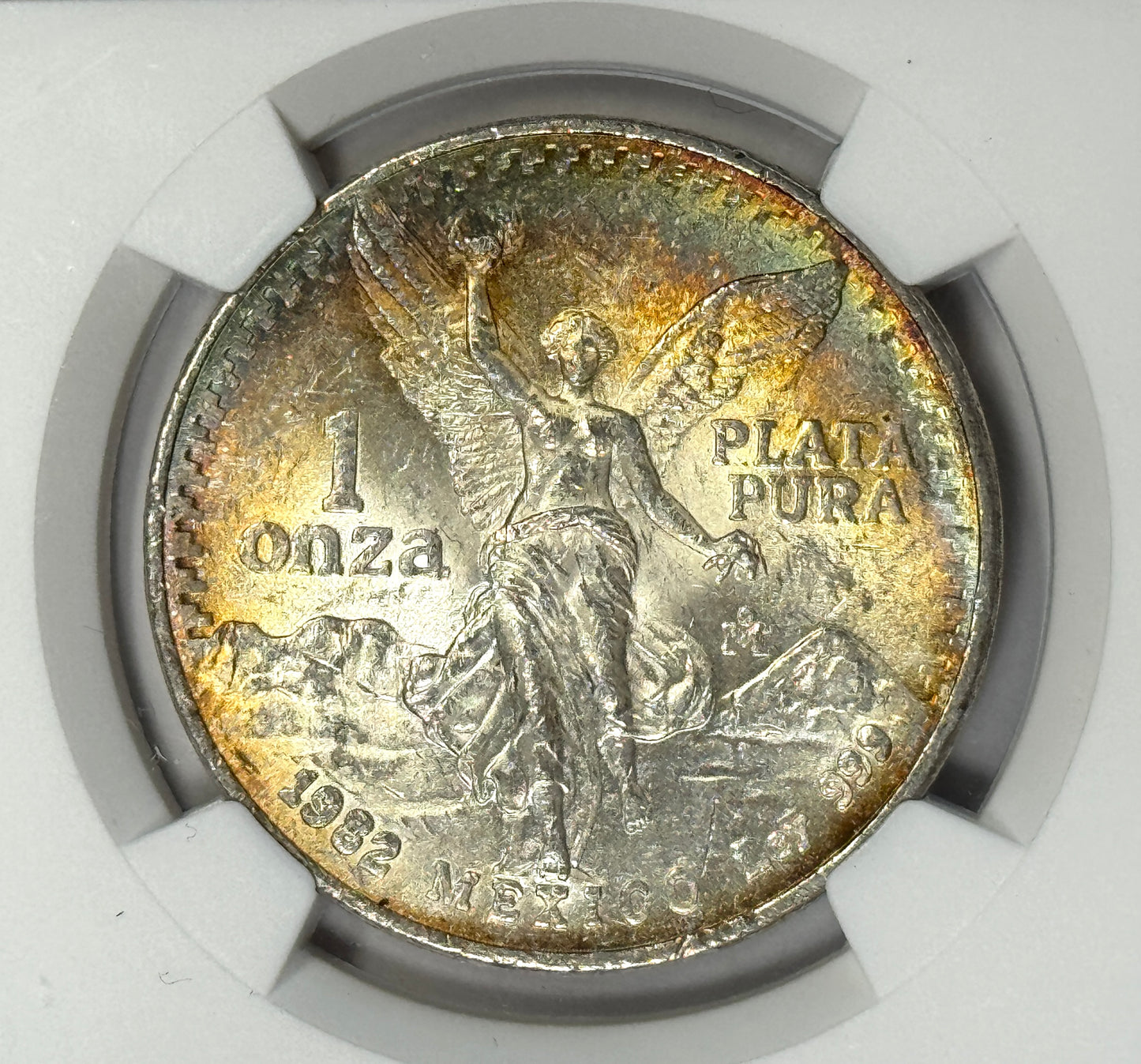 1982 Mexico Silver Onza Libertad Coin MS62 NGC - Original Dual sided Rainbow Toning