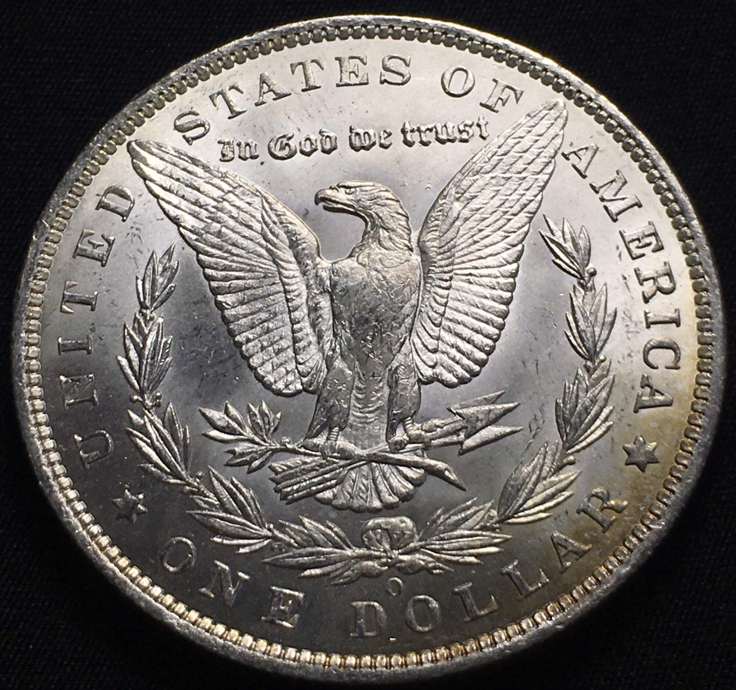 1885-O Morgan Silver Dollar - Rainbow Toning on Rim