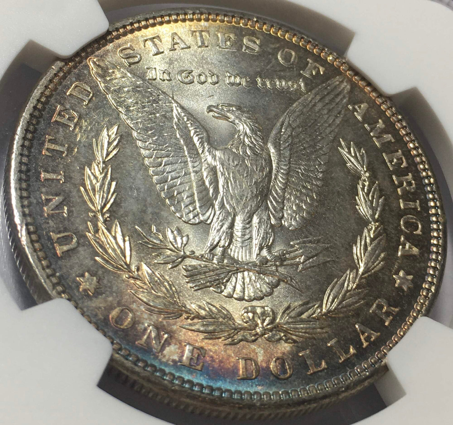 1886 Morgan Silver Dollar NGC MS63 Cartwheel Luster - Reverse Rim Rainbow Toned