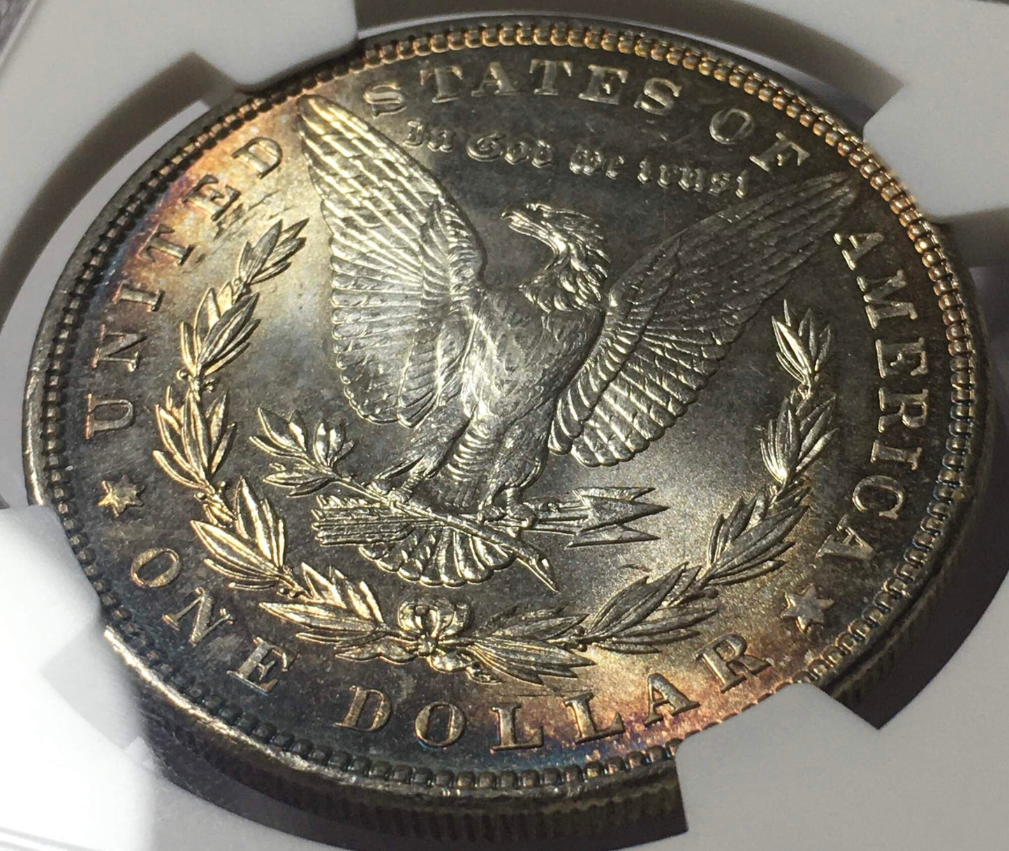 1886 Morgan Silver Dollar NGC MS63 Cartwheel Luster - Reverse Rim Rainbow Toned