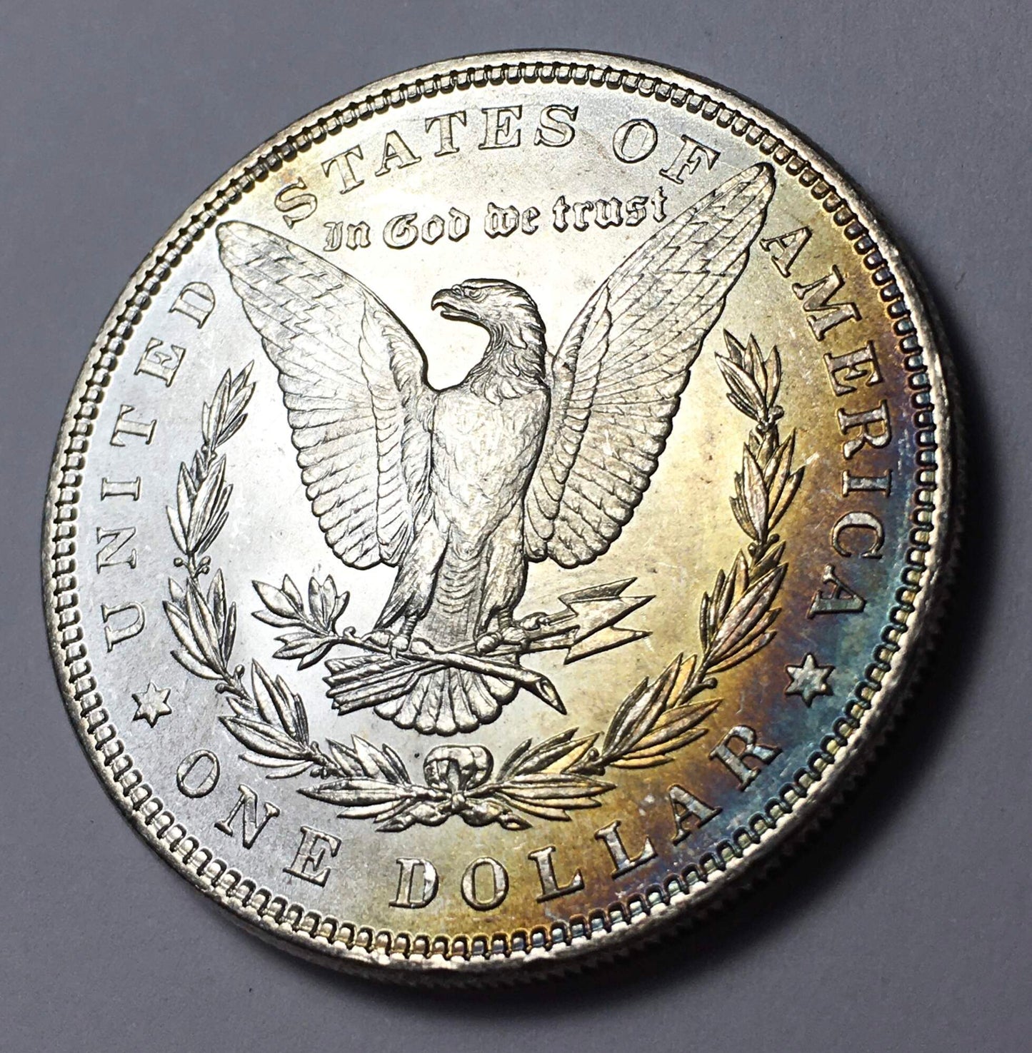 1885-P Morgan Silver Dollar - AU+ Coin with Rainbow-Toned Reverse