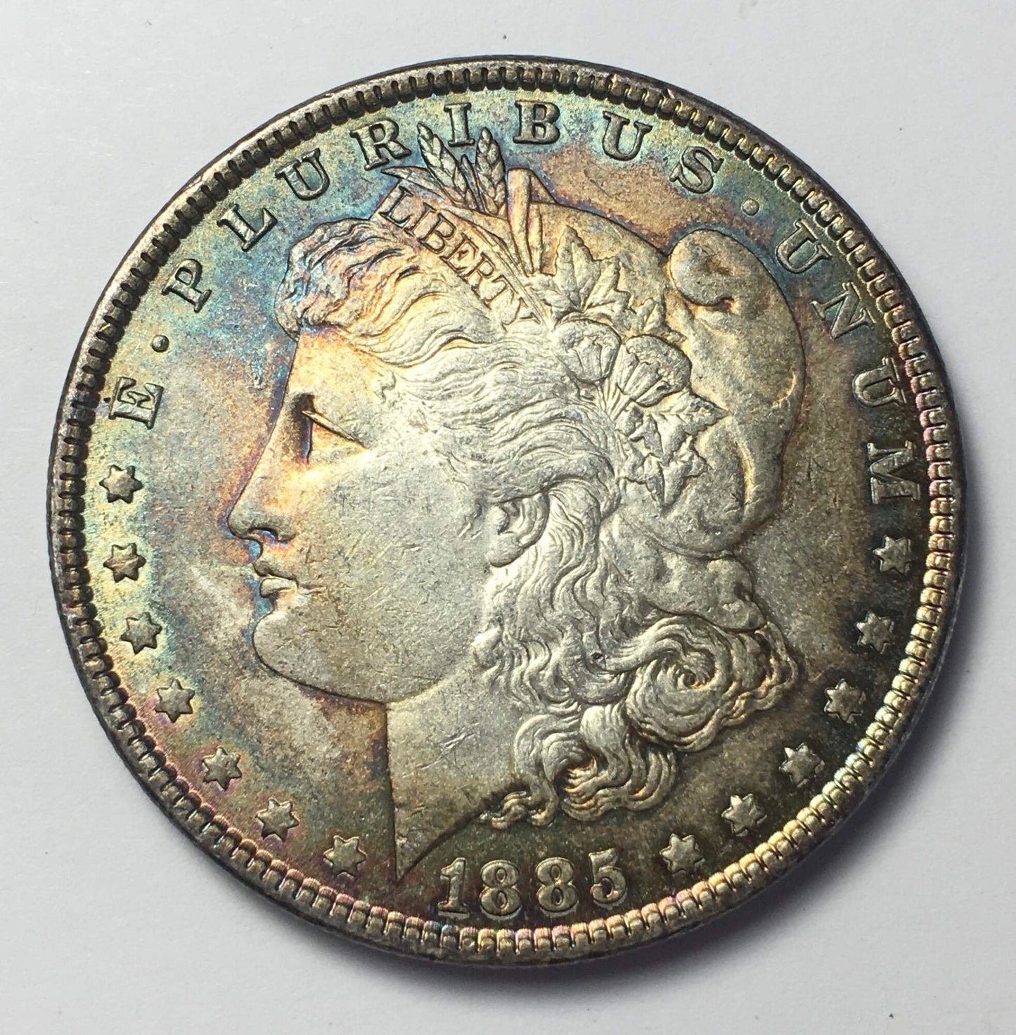 1885-P Morgan Silver Dollar BU - Stunning Rainbow Gun Metal Blue Toning