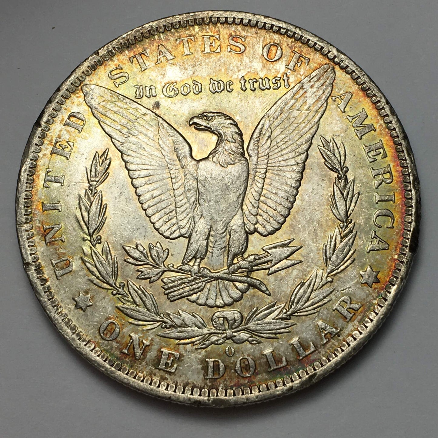 1883-O Morgan Silver Dollar BU with Rainbow and Seafoam Green Toning