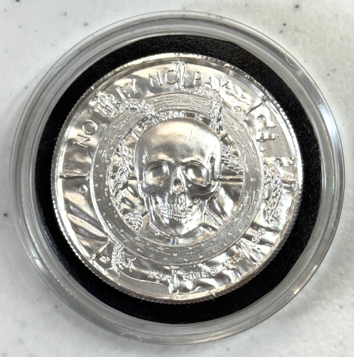 The Storm Privateer Series 2 oz Silver Ultra-High Relief Round in ATH