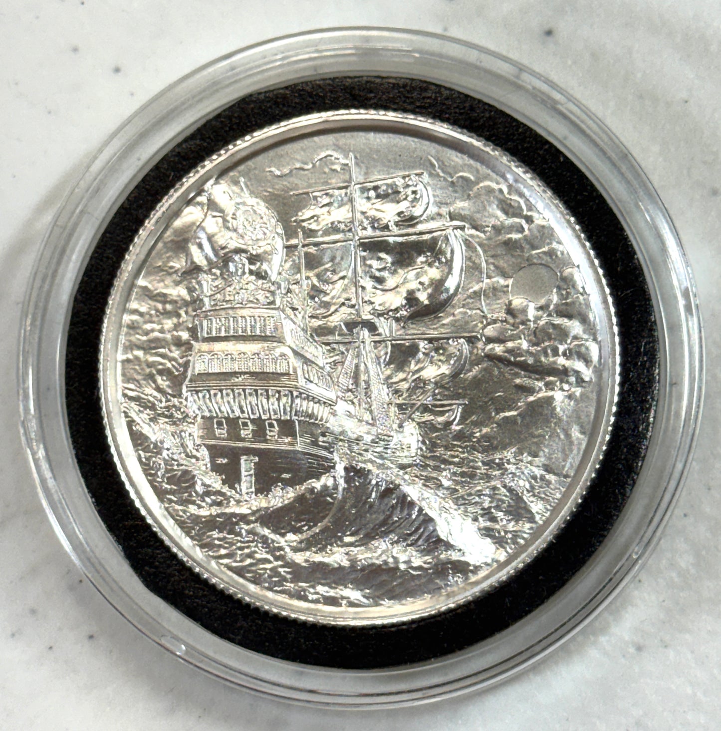 The Storm Privateer Series 2 oz Silver Ultra-High Relief Round in ATH