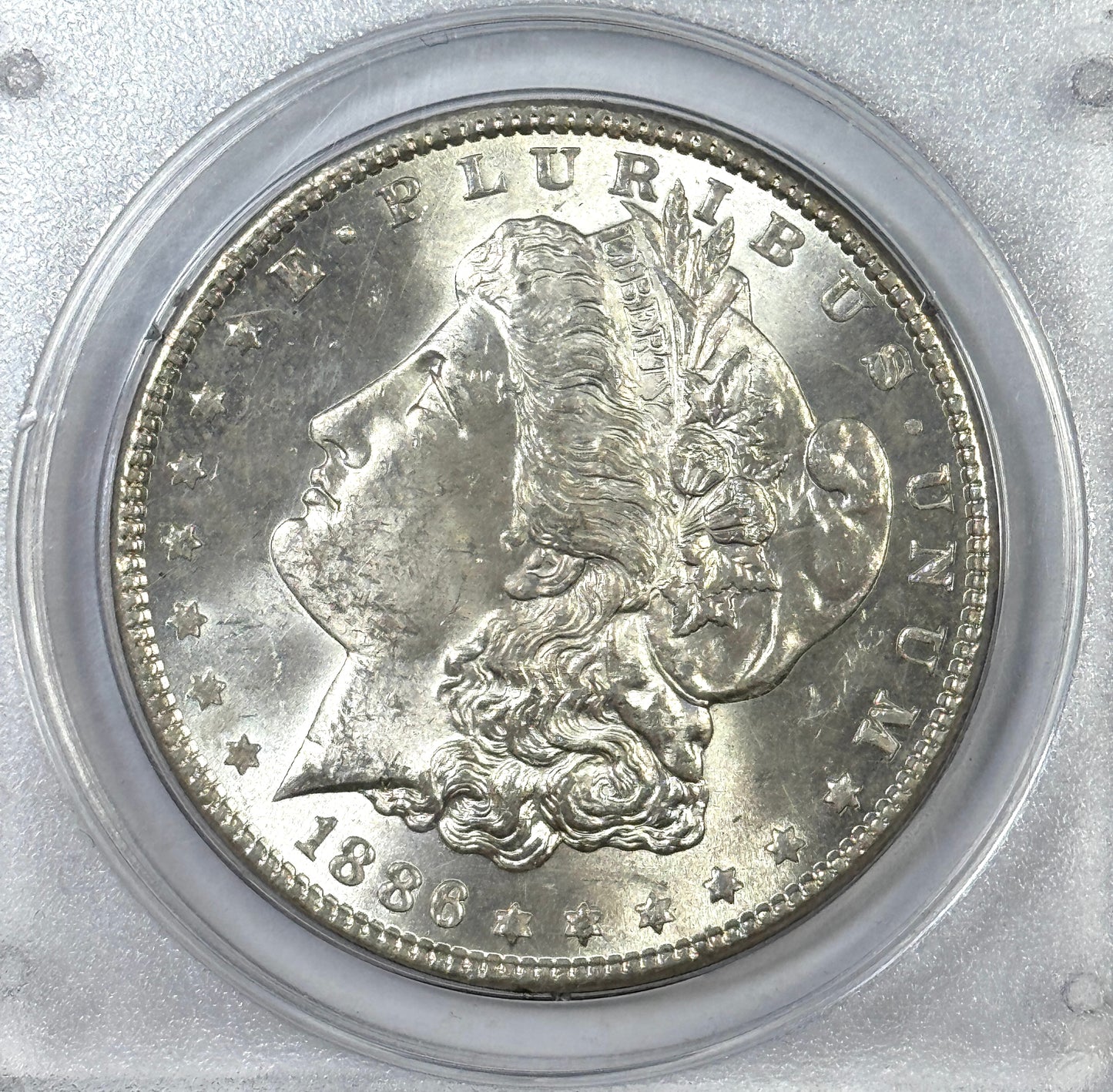 1886 Morgan Silver Dollar MS63 PCGS Rattler OGH - Very Lustrous Coin!
