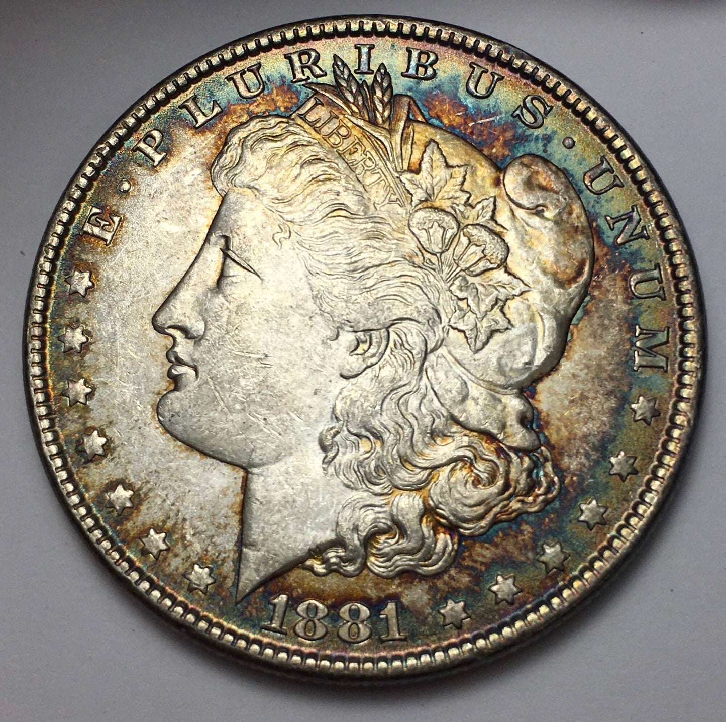 1881-P Morgan Silver Dollar Uncirculated - High Grade - Gun-Metal Blue Rim Toning