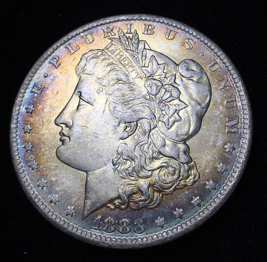 1883-O Morgan Silver Dollar BU - Obverse Rainbow Toning