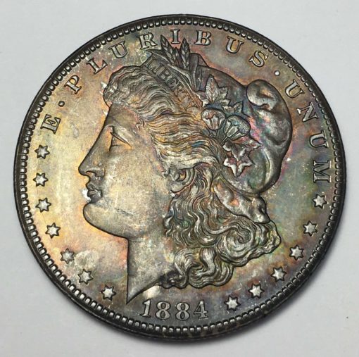 1884-cc-morgan-silver-dollar-deep-rainbow-toning-bu-brilliant-uncirculated-(2)